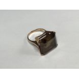 A 9ct gold smokey quartz dress ring, gross weight 8.3g, ring size N