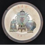 A large unusual decorative wall plate with an oriental themed scene of pots, and cloud design rim,