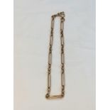 9ct rose gold, solid elongated bar and link chain. Weighs 42.4 grams, measures 17 inches in length.