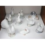 SECTION 23. A large Lladro porcelain dove, together with six Nao geese, a Nao duck and a Nao puppy