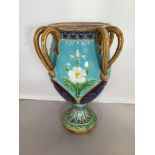 A Minton Majolica vase, of baluster form with four double loop handles (one off but pieces present