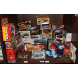 SECTIONS 37 & 38. Two shelves of toy cars including Vespas, limited edition buses, friction Benz,