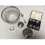 A collection of assorted silver and silver-plated wares comprising a silver-mounted bowl by Kemp