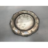 A continental .900 grade silver salver with shaped and carved rim, 37cm diameter, gross weight