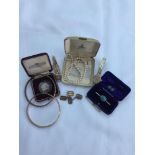 A collection of jewellery and watches including a lady's Omega watch, a lady's gold case on rolled