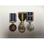 An ERII Territorial medal and a National Service medal with Canal-Zone clasp, both named to '