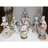 SECTION 2. A pair of Ernst Bohne & Sohne Figural candlesticks modelled as a lady and gentleman in