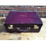 A purple leather and dark pink satin lined suitcase / vanity case, inscribed in gold lettering 'To