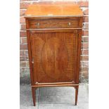 An Edwardian satinwood veneered and cross-banded pier cabinet in the Sheraton 'style' by Maple & Co,