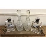 A pair of silver-mounted, glass decanters by Hukin & Heath, of rectangular form, hallmarked