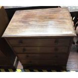 A 19th century Continental mahogany chest of four graduated walnut-lined drawers with brass pulls,