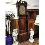 A late 18th / early 19th century mahogany longcase clock, swan neck pediment with stylised flowers