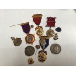 Of Masonic interest, a small collection of assorted gilt-metal and enamel jewels for the National