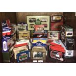 A collection of approximately 34 boxed die-cast model cars including Matchbox 'Models of