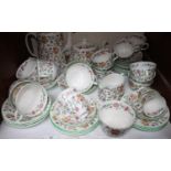 SECTION 19. Minton 'Haddon Hall' pattern tea and coffee set including six large teacups and seven