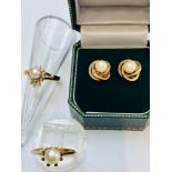 An assorted lot consisting of a 9ct gold pearl ring, weighing 2.5 grams, Finger size N. Together