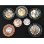 Seven Prattware pot lids including 'Hide and Seek', 'The Cavalier', 'The Flute Player', 'The Fish