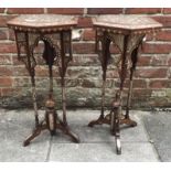 A pair of 19th century walnut and mother-of-pearl inlaid hexagonal occasional tables of Islamic