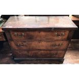 An 18th century walnut veneered chest of three long drawers and hinged and folding rectangular table