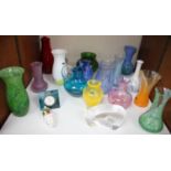SECTION 26. A collection of small coloured glass vases and paperweights, mainly Caithness