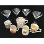 Four Villeroy & Boch martini glasses, 16cm high together with some Royal Commemorative mugs
