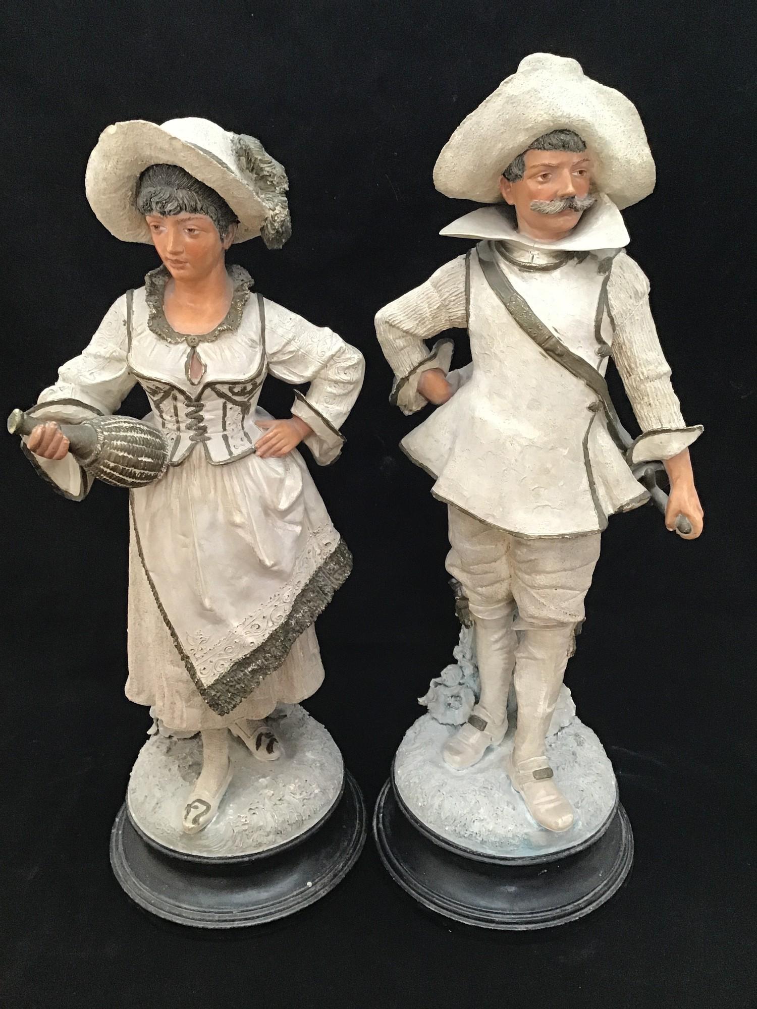 A pair of large pottery figures of a European gentleman with sword and a lady in traditional dress - Image 3 of 3