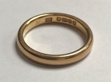 A 22ct gold wedding band, gross weight approximately 4.4g