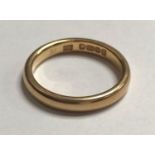 A 22ct gold wedding band, gross weight approximately 4.4g