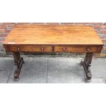 An early Victorian rosewood side table, of rectangular form with two frieze drawers and turned pulls
