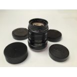 A Leitz Canada Tele-Elmarit 90mm 1:2.8/90 lens and two spare covers