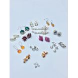 A selection of silver earrings, consisting of 15 x pairs set with various stones, including