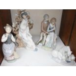 SECTION 22. A Lladro figure group of three polar bears, together with a Lladro figure of an Oriental