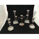 A good quality pair of silver-plated candlesticks by Elkington & Co. modelled as classical