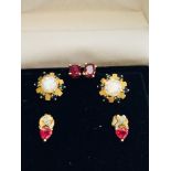 An assorted lot of 9ct gold earrings, consisting of 2 pairs set with rubies and 1 pair set with