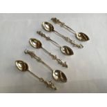 A set of six Victorian silver tea spoons by B Muller & Son, the handles modelled as orchestral