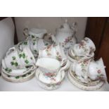 SECTION 23. A Royal Albert 'Moss Rose' pattern tea set comprising six each cups, saucers and