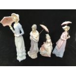 Four various Lladro figurines including three ladies and a girl, all holding parasols, the tallest