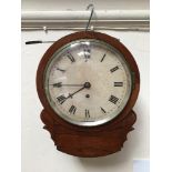 A Victorian rosewood drop-dial clock with white painted dial, black roman numerals, brass bezel,