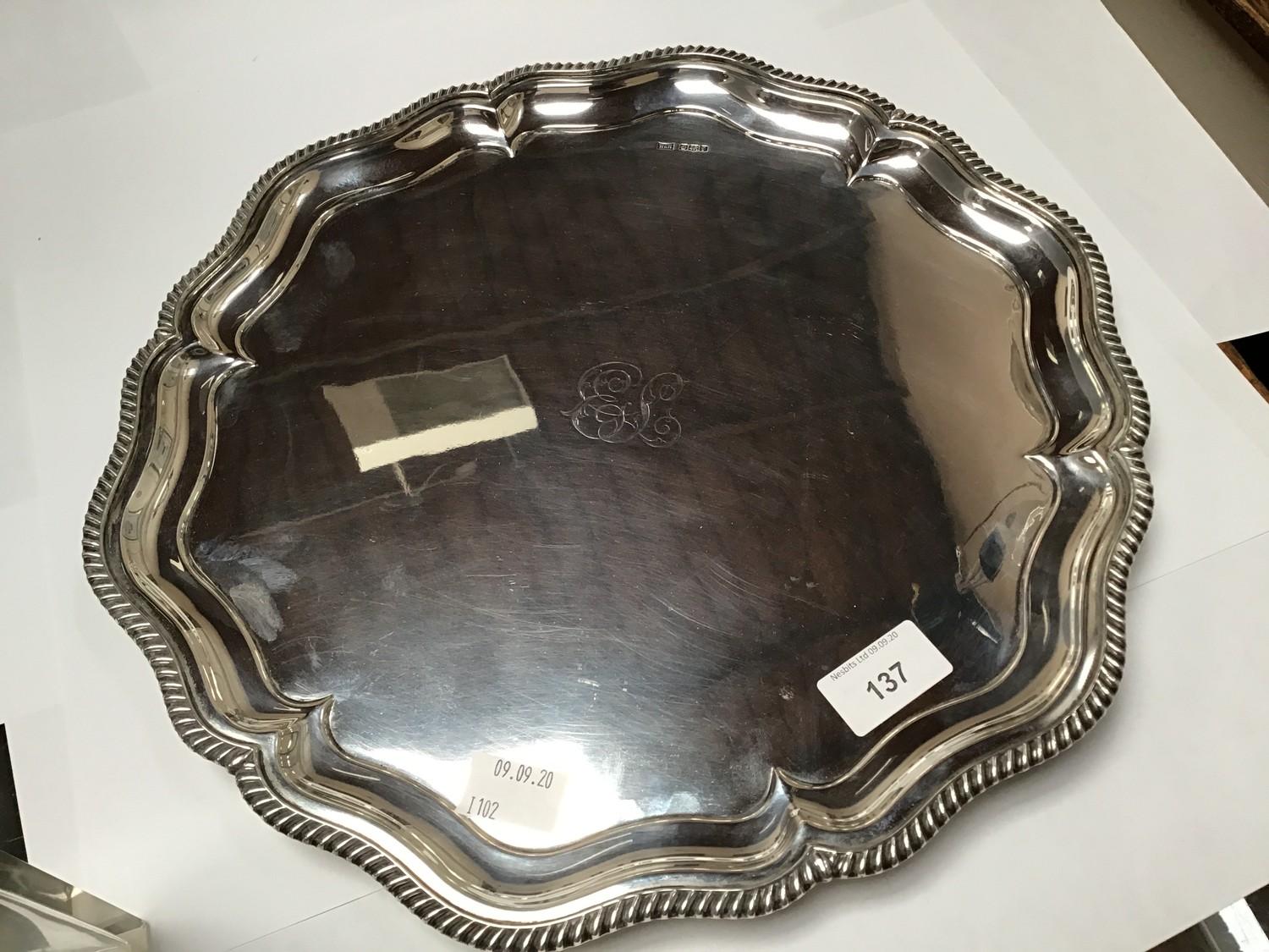 A shaped silver salver by Walker & Hall with gadrooned, pie-crust rim, hallmarked Sheffield, 1923,
