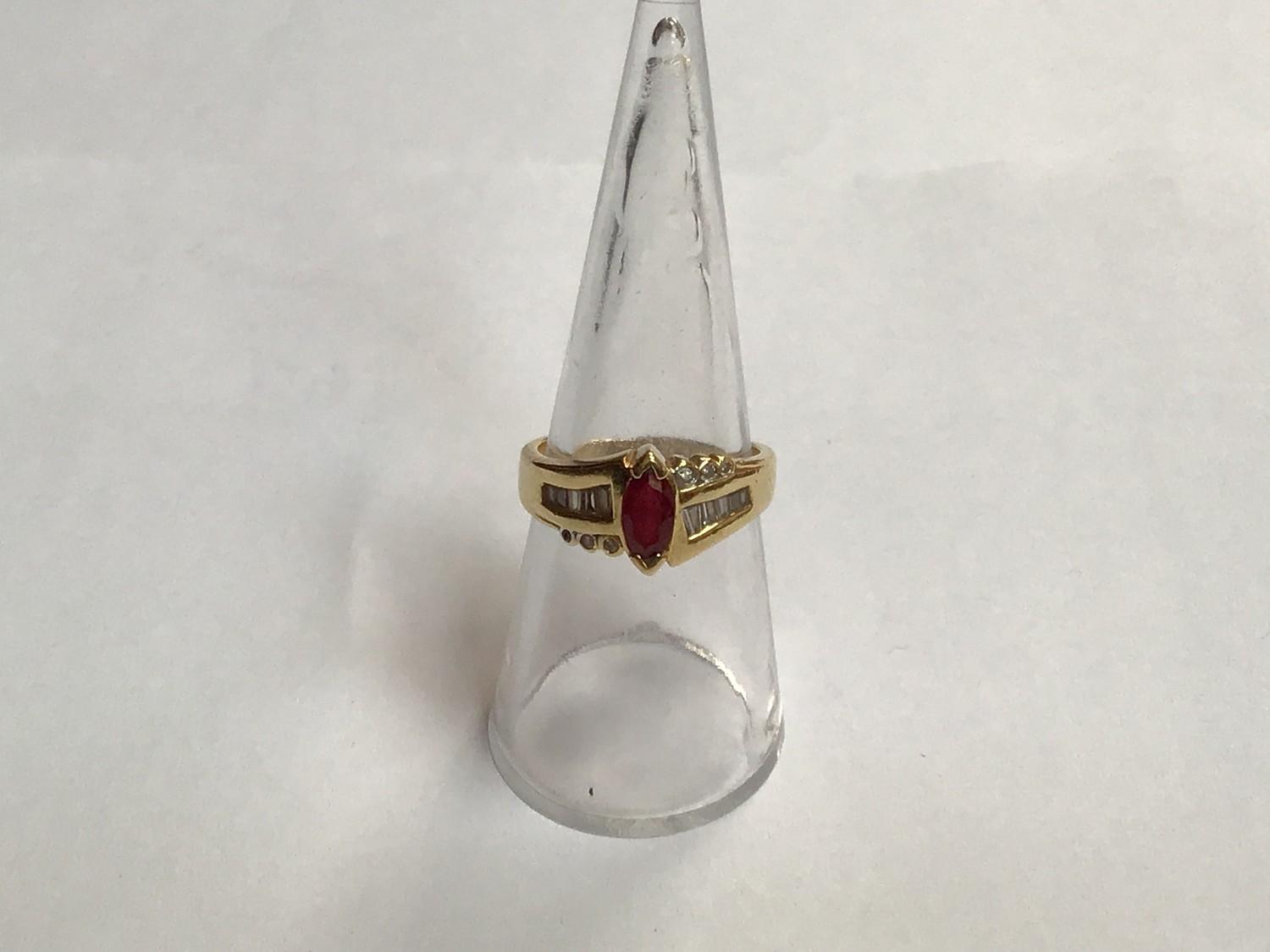 An 18ct gold ring, claw set with a marquise cut ruby, estimated weight of ruby 0.70cts, the - Image 2 of 3