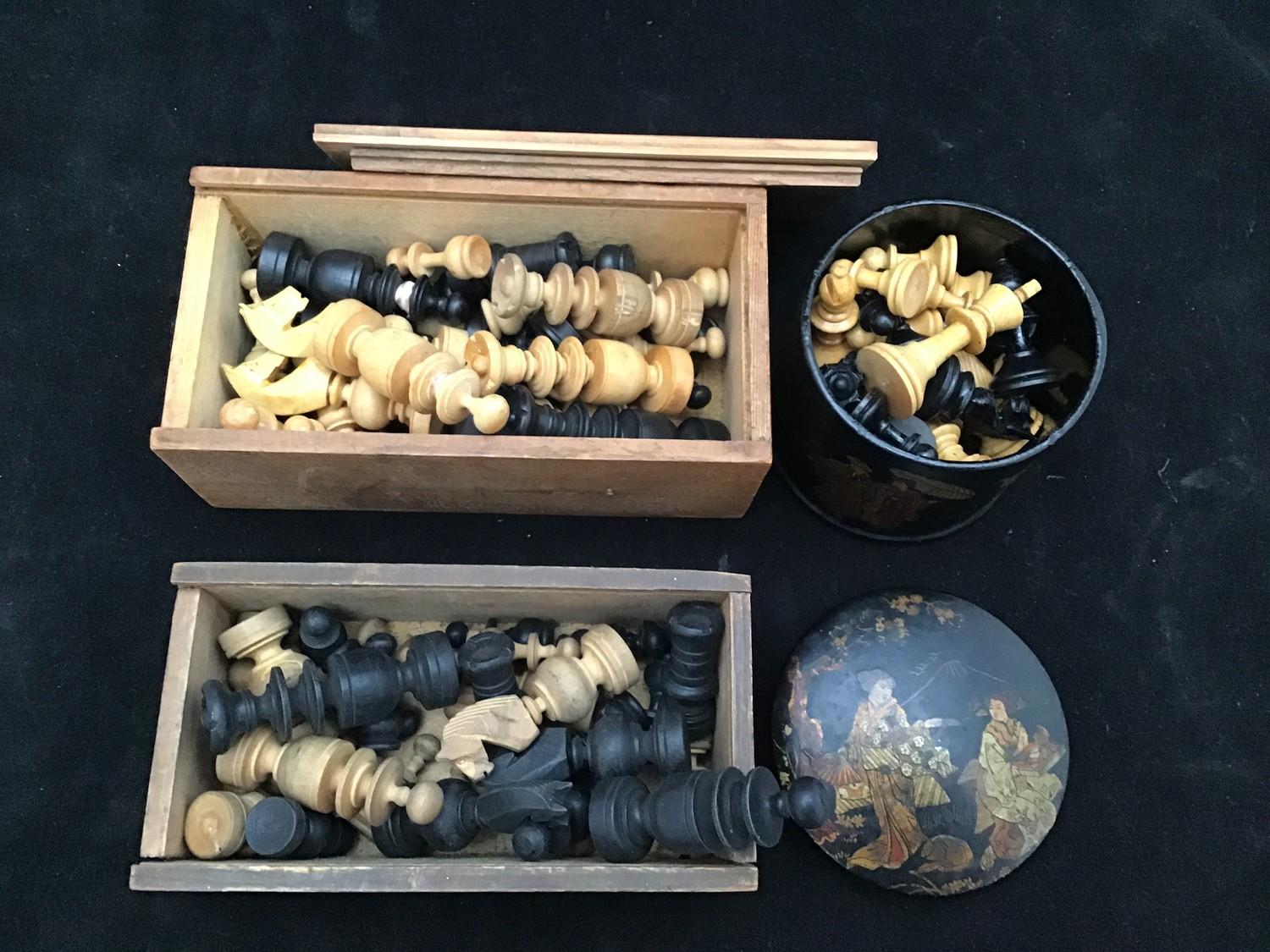 Three various chess sets including a Staunton pattern set, two boxed, oriental black lacquered pot