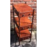 A Victorian mahogany three-tier whatnot, of rectangular form with turned supports and three drawers,