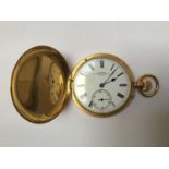 An 18ct gold full hunter pocket watch by Webster, the white enamel dial with Roman numerals denoting
