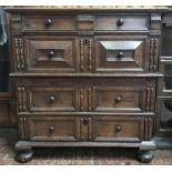 A Charles II Oak two-part chest of drawers, with split-bobbin pilasters and fielded drawers with