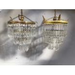 Two similar gilt and three tier crystal drop light fittings, drop approx. 30cm