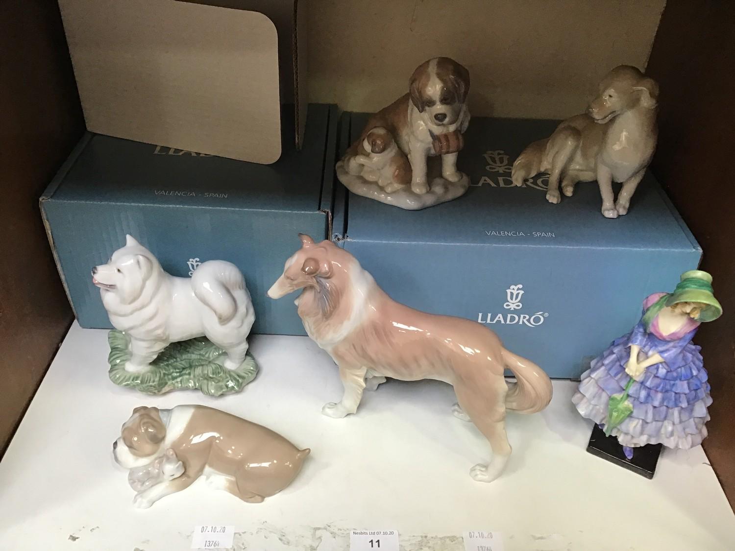 SECTION 11. Five assorted Lladro figural models of dogs including 'Unlikely Friends 6417' and '