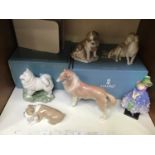 SECTION 11. Five assorted Lladro figural models of dogs including 'Unlikely Friends 6417' and '