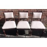 A set of six 19th century stained walnut standard dining chairs, with carved crest rails and