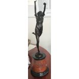 After Bruno Zach, a patinated bronze figure of dancer, on onyx and rouge marble base, 64cm high