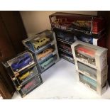 13 boxed die cast models including 4 Trailer Series, 3 Maisto Superior Motorized cars, 3 Saico Die